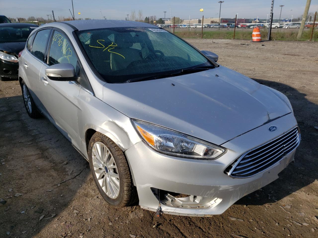 FORD FOCUS TITA 2016 with VIN 1FADP3N22GL302669 - Photo from auction