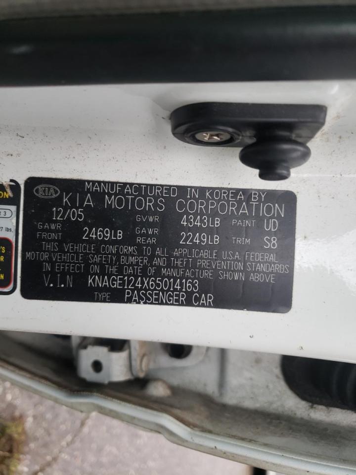 Photo 10 from auction – 2006 KIA OPTIMA LX with VIN KNAGE124X65014163