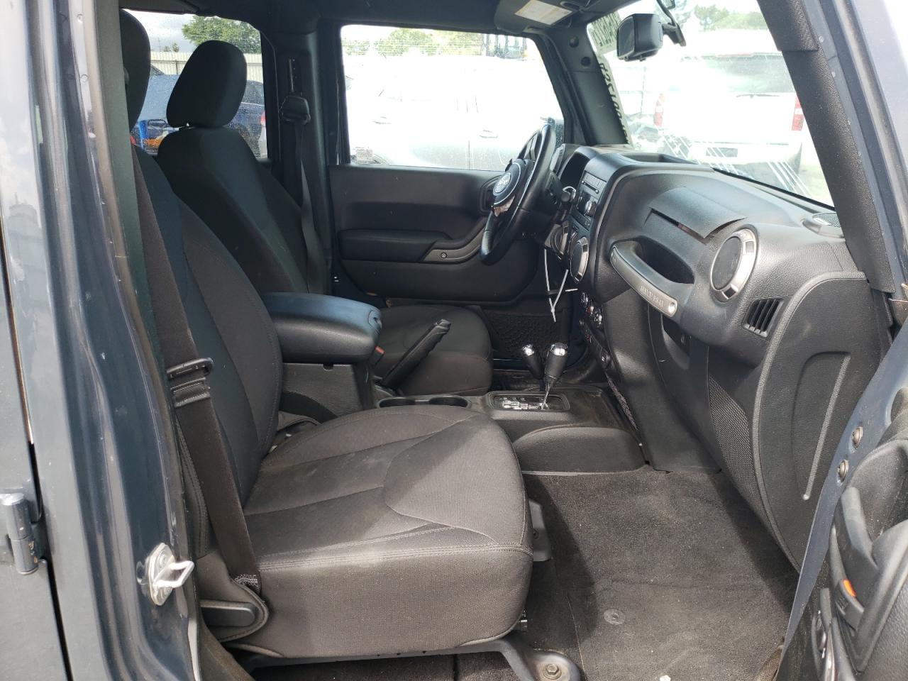 Photo 5 from auction – 2016 JEEP WRANGLER U with VIN 1C4BJWDG2GL315648