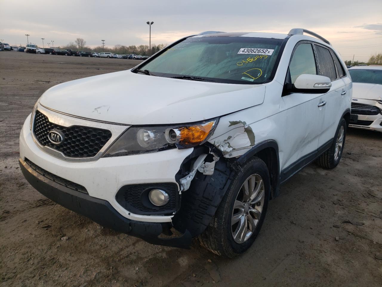 Photo 2 from auction – 2011 KIA SORENTO EX with VIN 5XYKU4A14BG035035
