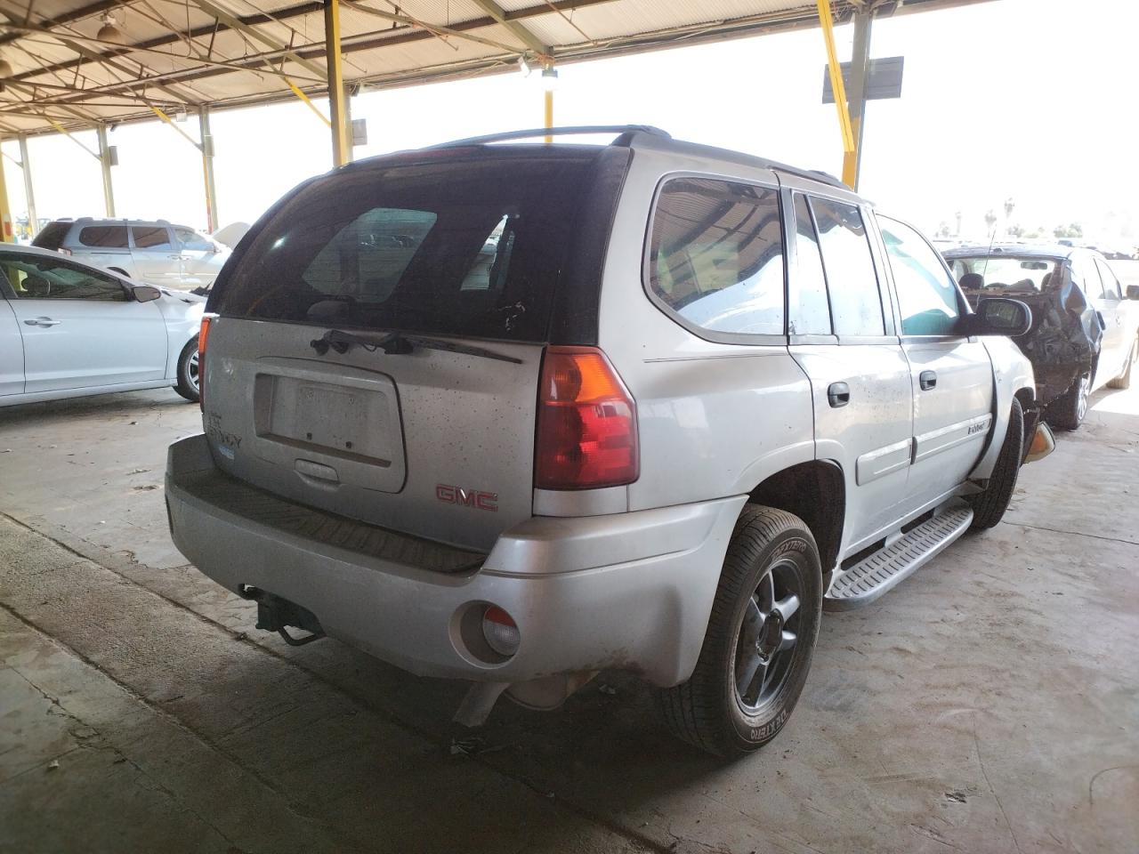 Photo 4 from auction – 2004 GMC ENVOY with VIN 1GKDS13S442348736