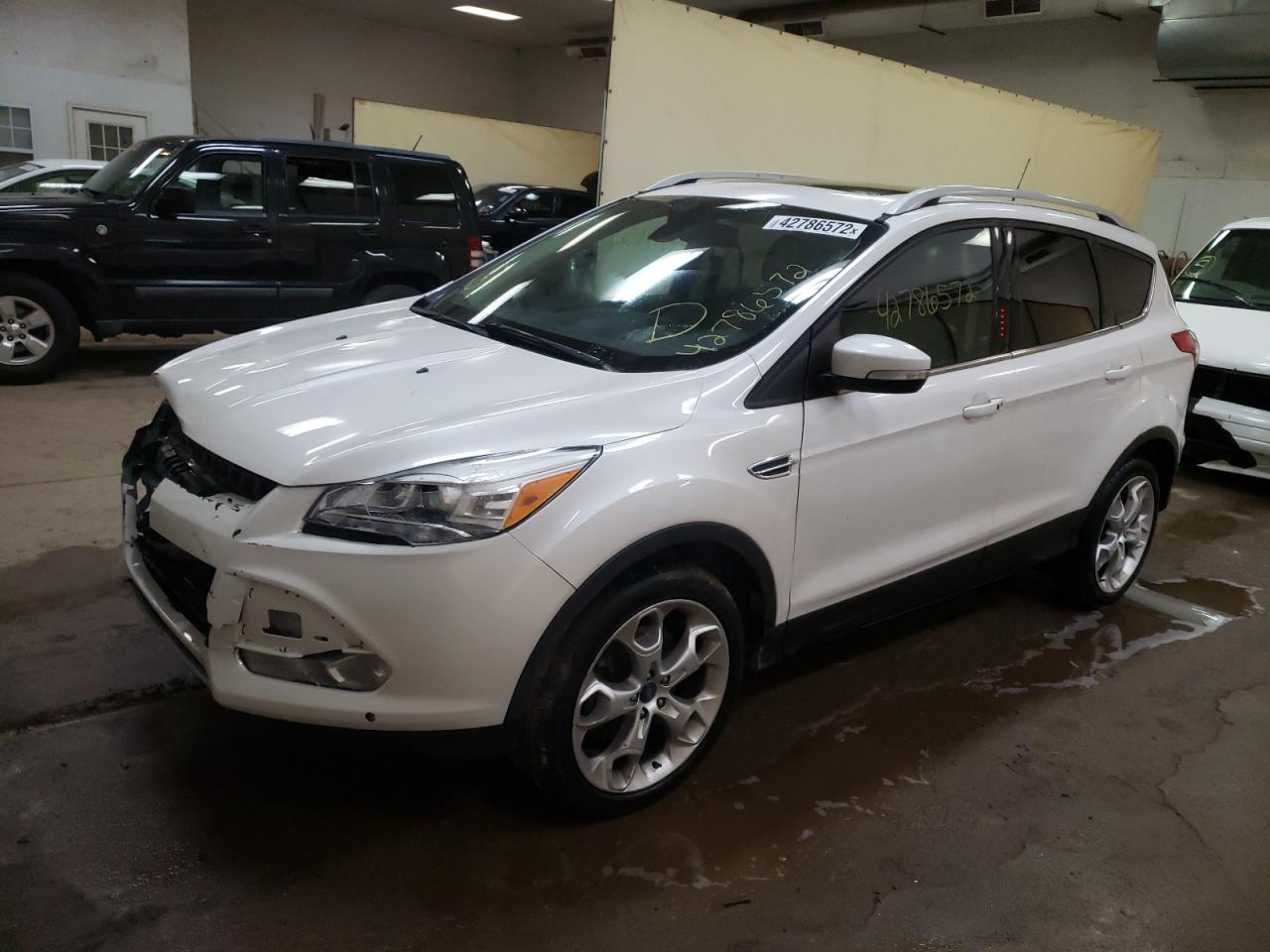 Photo 2 from auction – 2014 FORD ESCAPE TIT with VIN 1FMCU9J98EUB13080