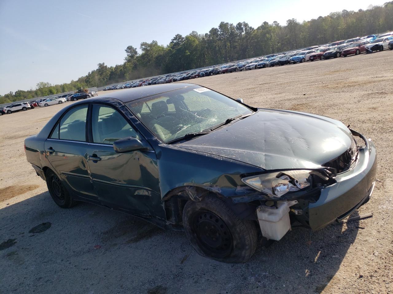TOYOTA CAMRY LE 2003 with VIN 4T1BE32K03U670277 - Photo from auction