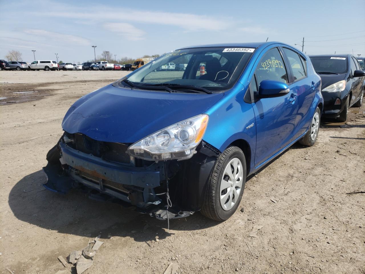 Photo 2 from auction – 2014 TOYOTA PRIUS C with VIN JTDKDTB34E1076084