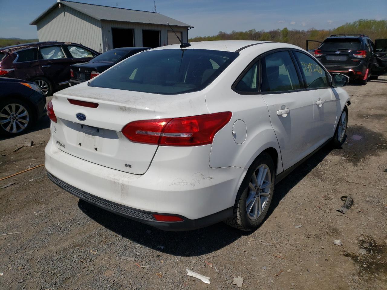 Photo 4 from auction – 2016 FORD FOCUS SE with VIN 1FADP3F21GL270179