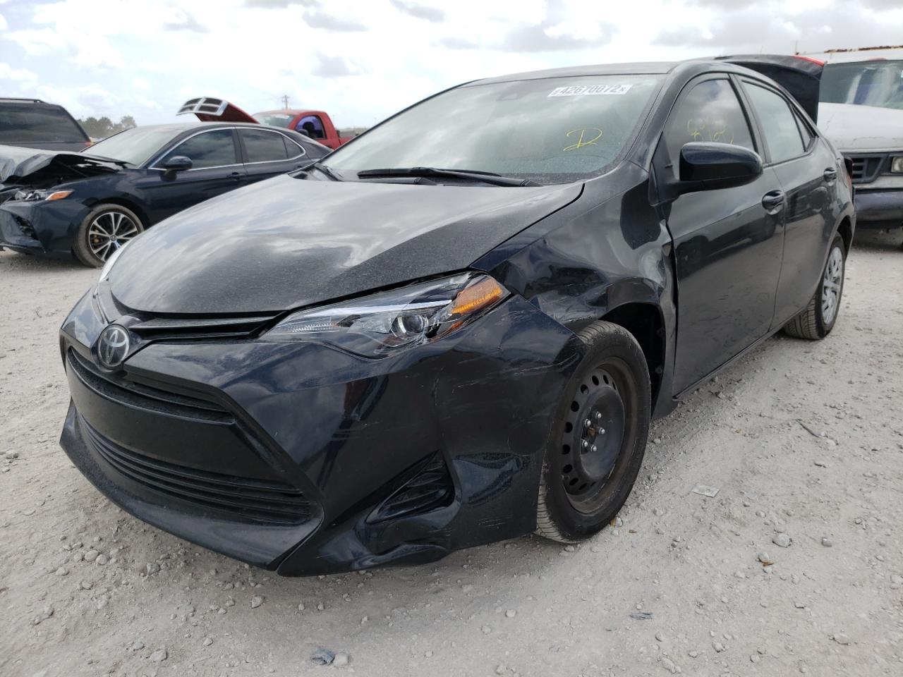 Photo 2 from auction – 2018 TOYOTA COROLLA L with VIN 5YFBURHE9JP839220