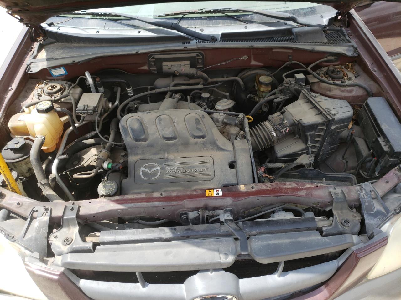 Photo 7 from auction – 2002 MAZDA TRIBUTE LX with VIN 4F2YU09132KM64121