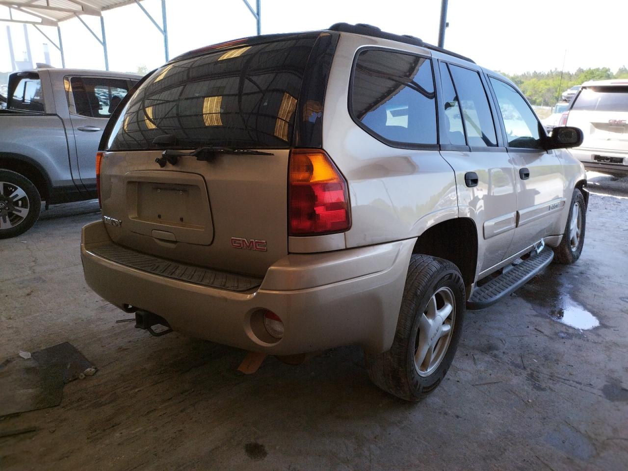 Photo 4 from auction – 2004 GMC ENVOY with VIN 1GKDS13S742368009