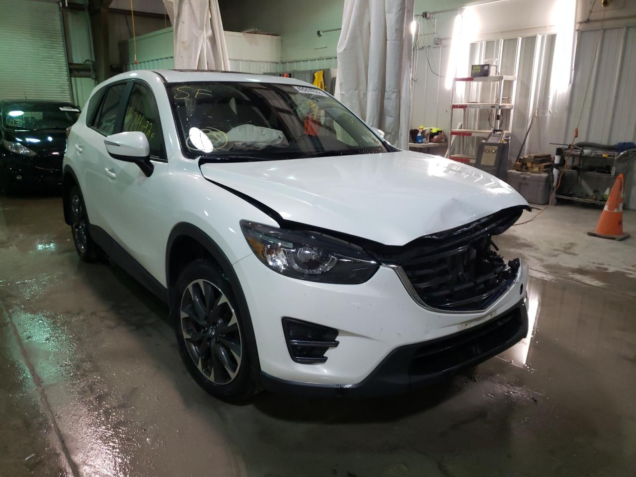 MAZDA CX-5 GT 2016 with VIN JM3KE4DY9G0691810 - Photo from auction
