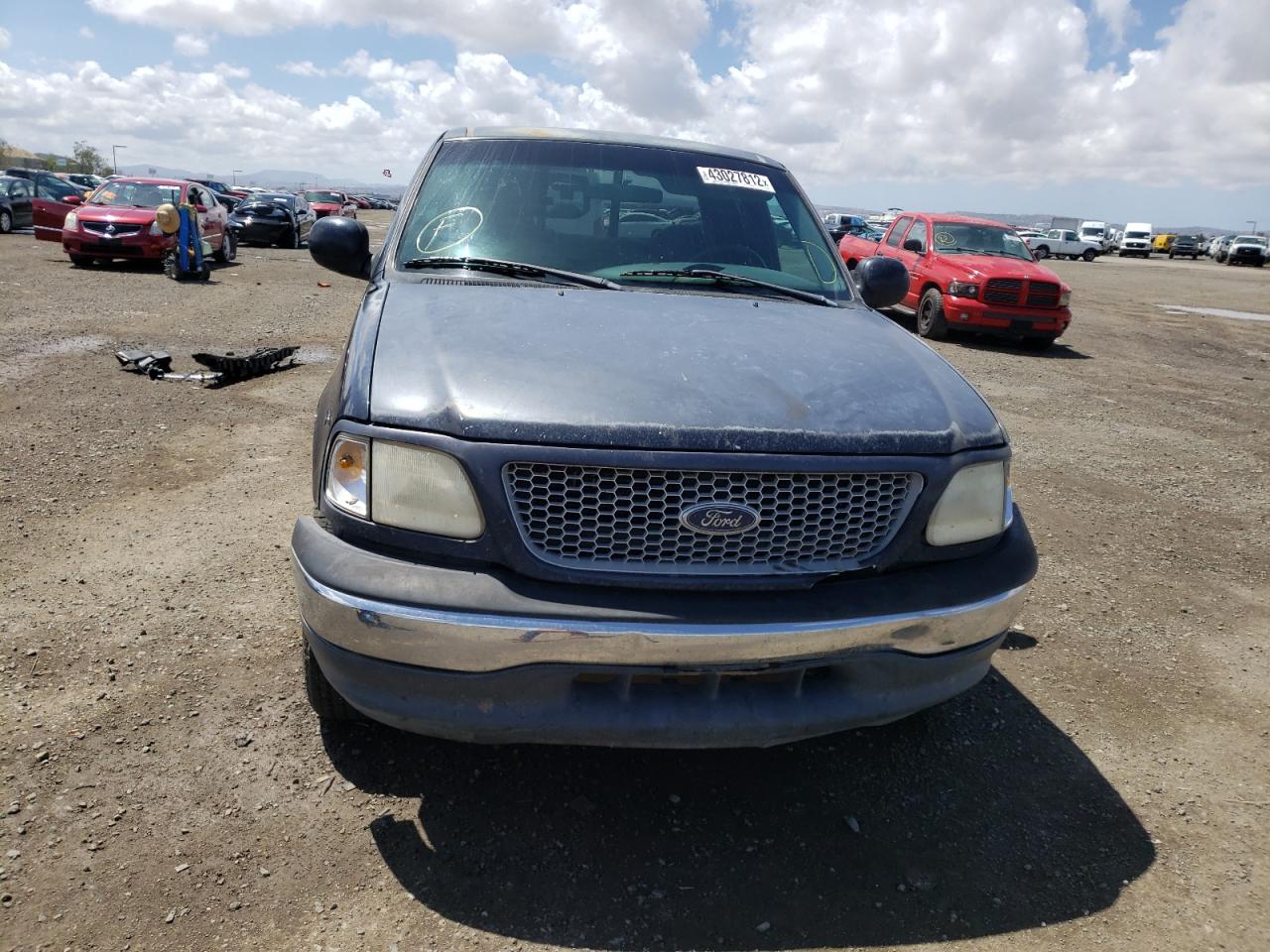 Photo 9 from auction – 1999 FORD F150 with VIN 1FTRX07W4XKB73936