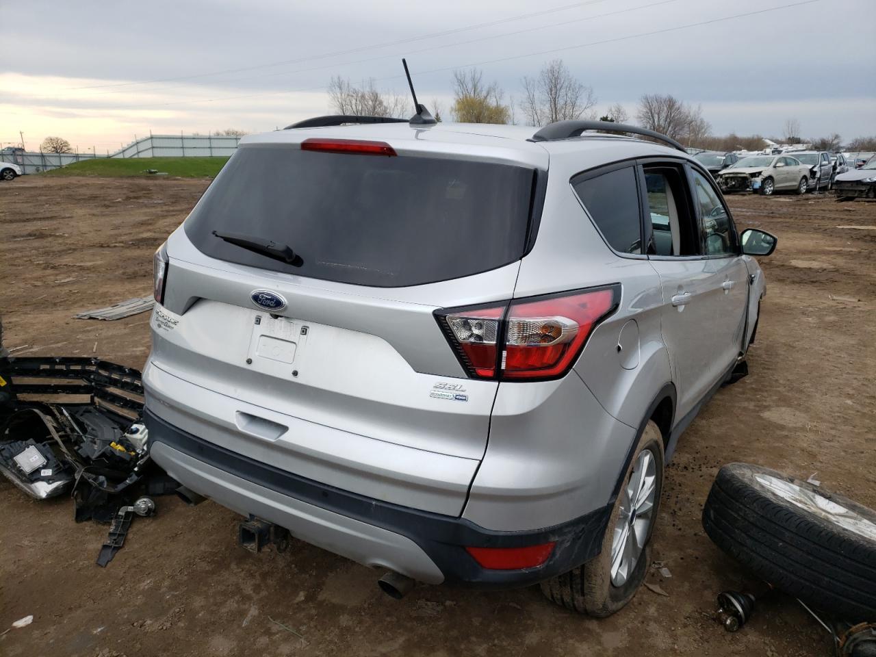 Photo 4 from auction – 2018 FORD ESCAPE SEL with VIN 1FMCU9HD5JUA30257