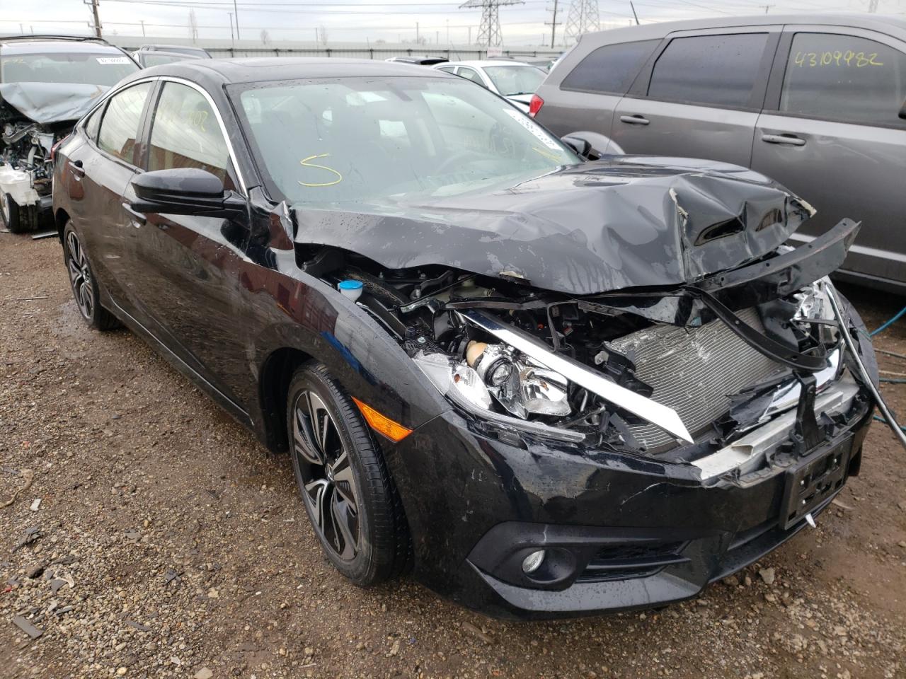 HONDA CIVIC EXL 2018 with VIN JHMFC1F70JX027900 - Photo from auction