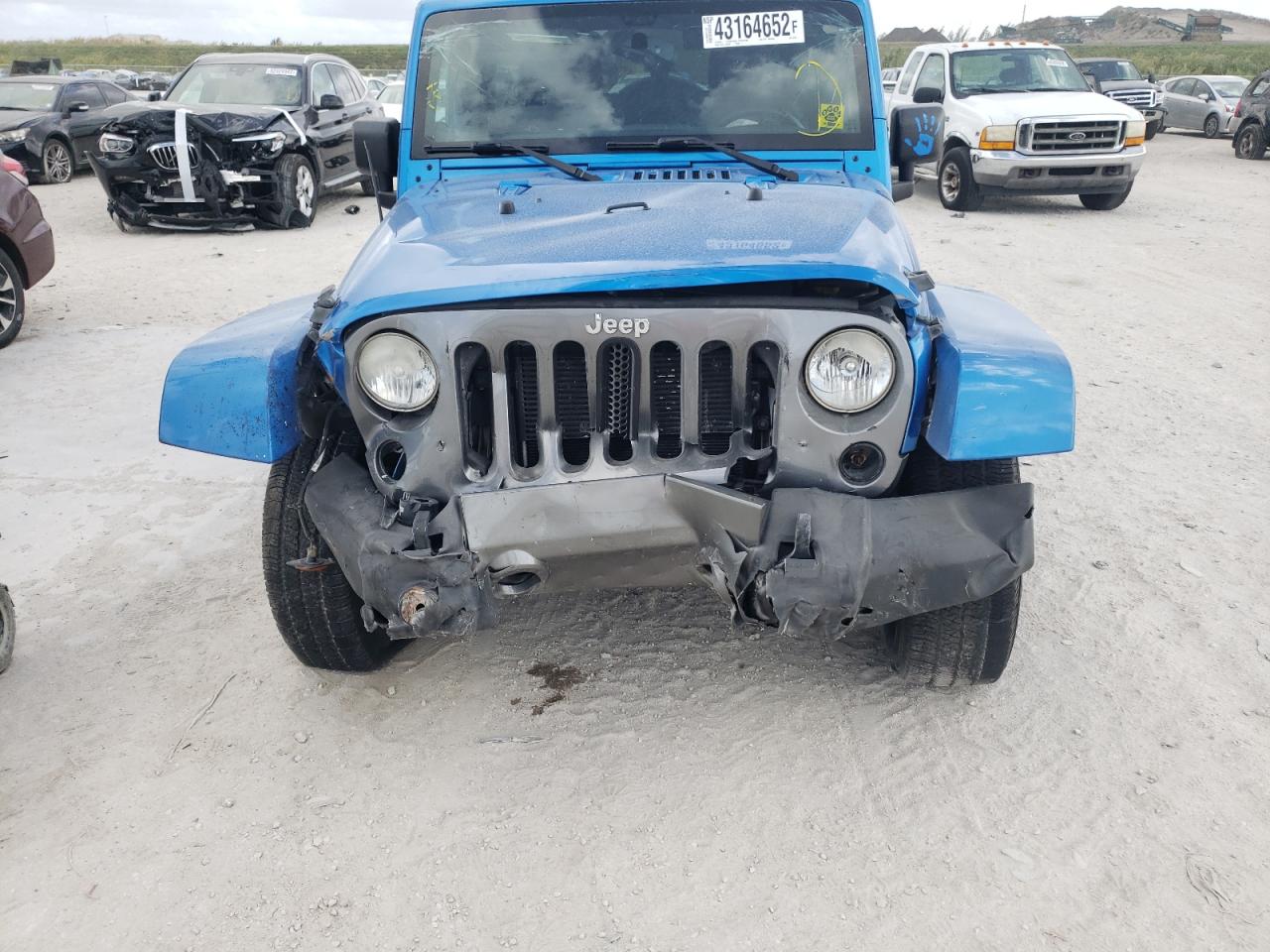 Photo 9 from auction – 2014 JEEP WRANGLER U with VIN 1C4BJWDG7EL222864