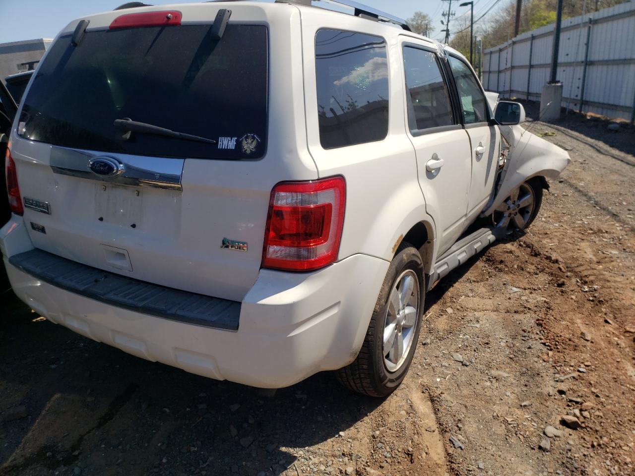 Photo 4 from auction – 2010 FORD ESCAPE LIM with VIN 1FMCU9EG2AKB55159