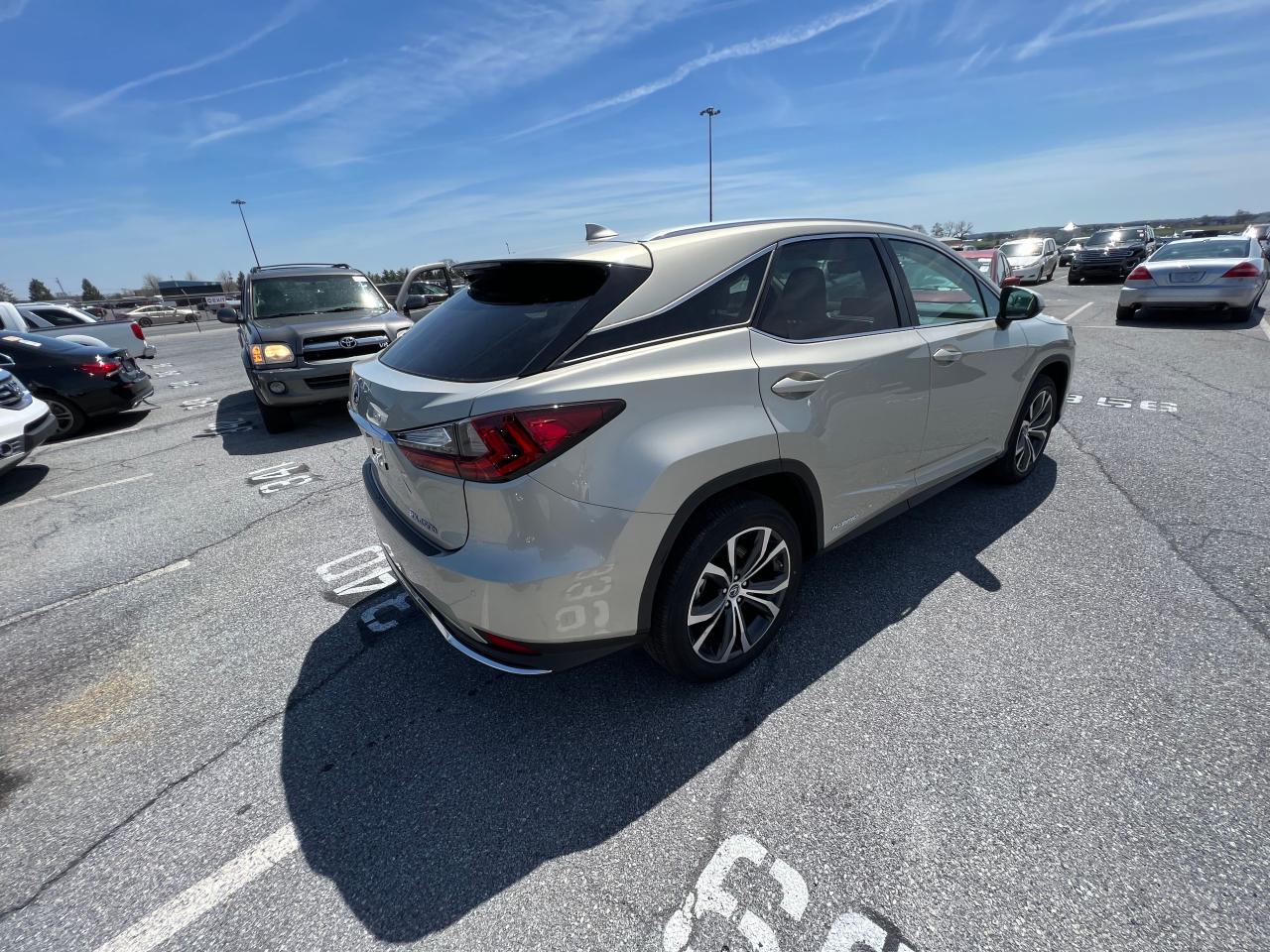 Photo 4 from auction – 2021 LEXUS RX 450H with VIN 2T2HGMDAXMC068693