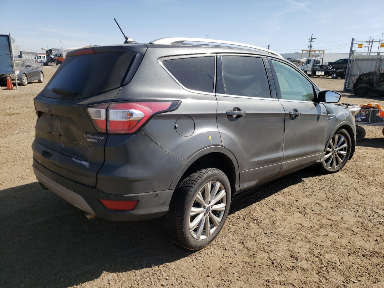 Photo 4 from auction – 2018 FORD ESCAPE TIT with VIN 1FMCU9J98JUA51545