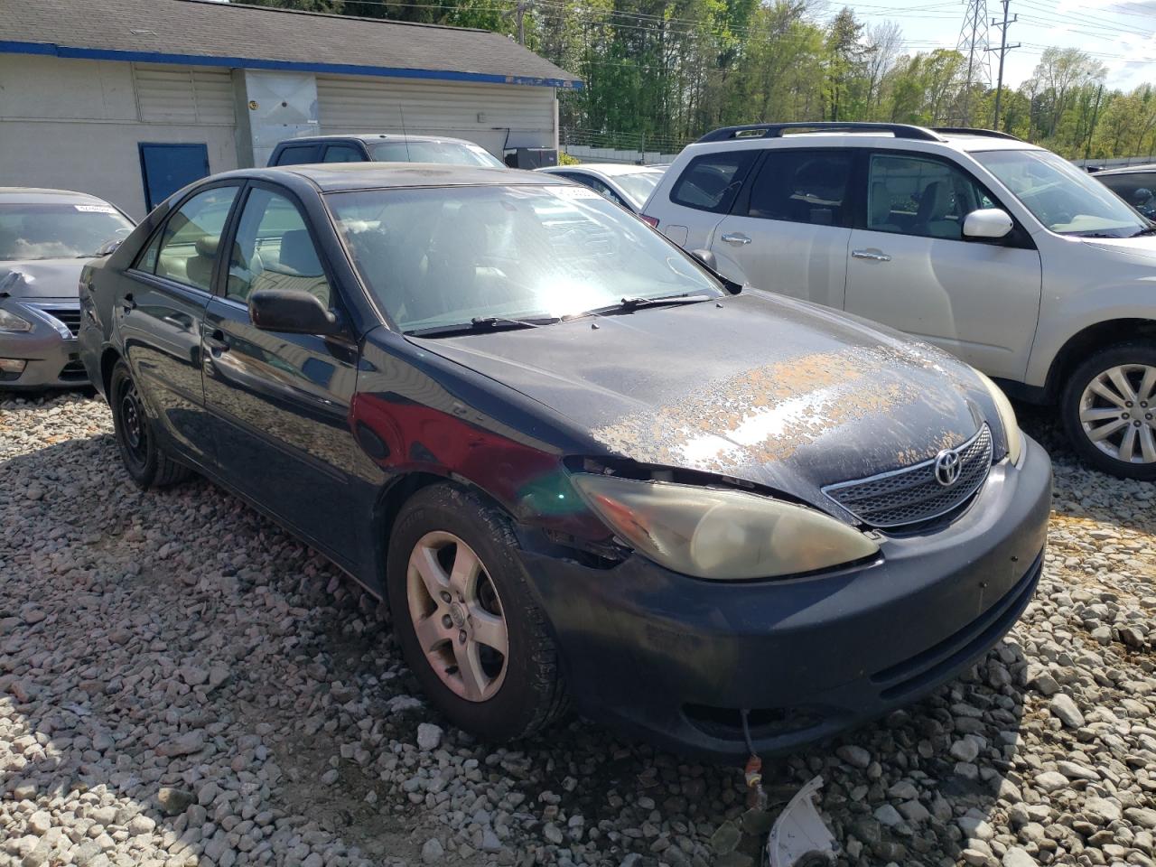 TOYOTA CAMRY LE 2002 with VIN 4T1BF30K82U027187 - Photo from auction
