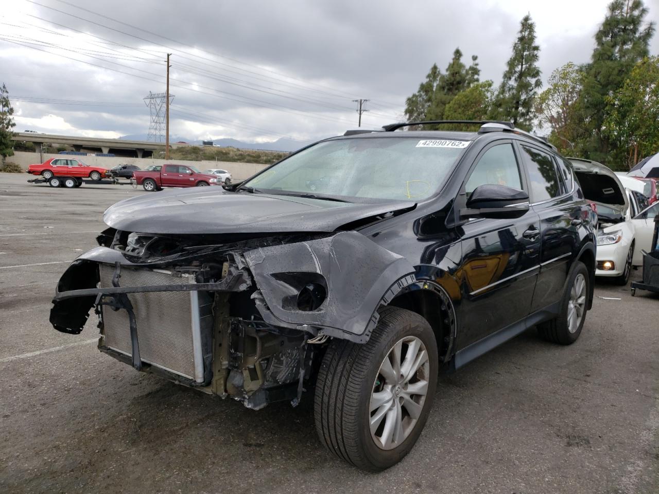 Photo 2 from auction – 2015 TOYOTA RAV4 LIMIT with VIN 2T3DFREV7FW381830