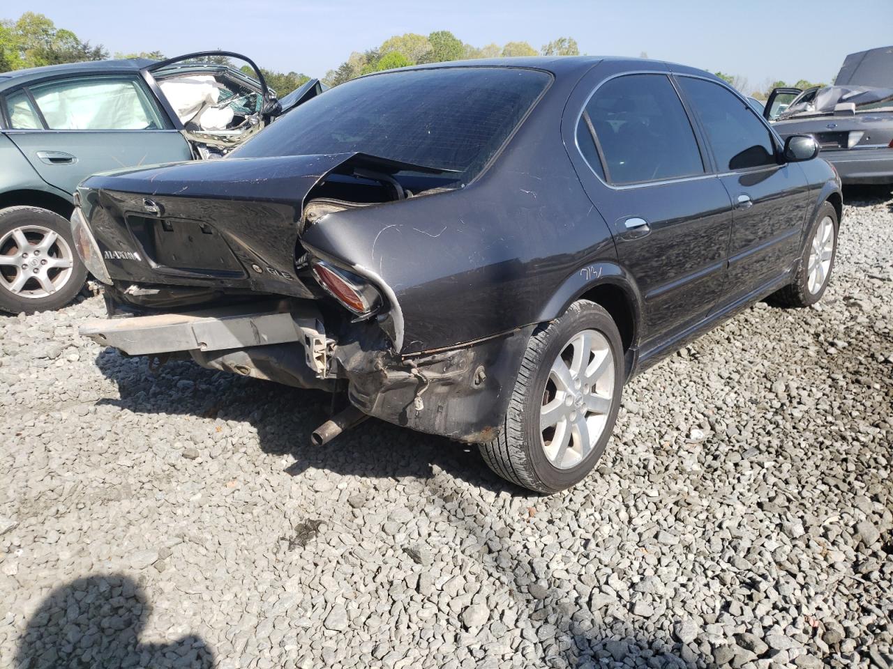 Photo 4 from auction – 2002 NISSAN MAXIMA GLE with VIN JN1DA31A52T304453