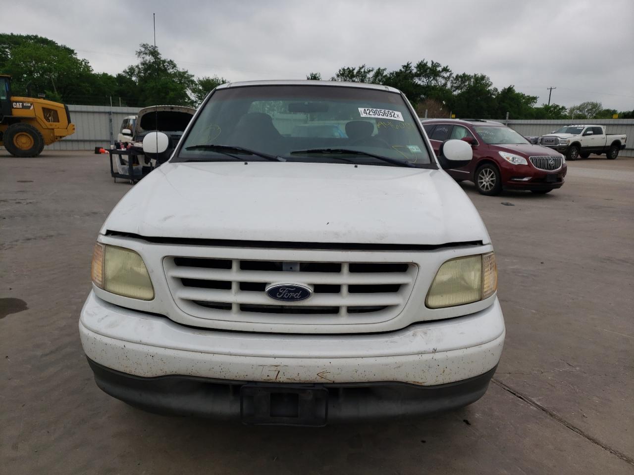 Photo 9 from auction – 2002 FORD F150 with VIN 1FTRX17272NA46009