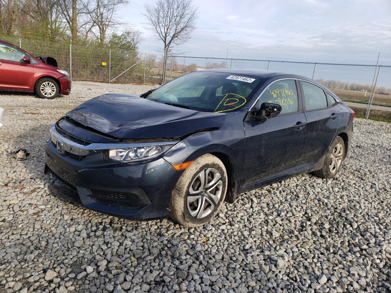 Photo 2 from auction – 2016 HONDA CIVIC LX with VIN 19XFC2F54GE027154