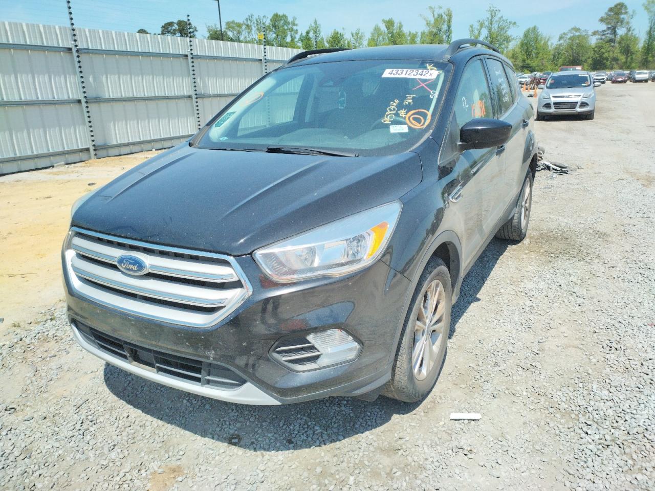 Photo 9 from auction – 2018 FORD ESCAPE SE with VIN 1FMCU9GDXJUA58346