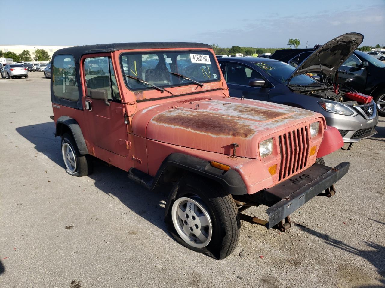 JEEP WRANGLER / 1990 with VIN 2J4FY19E9LJ514021 - Photo from auction