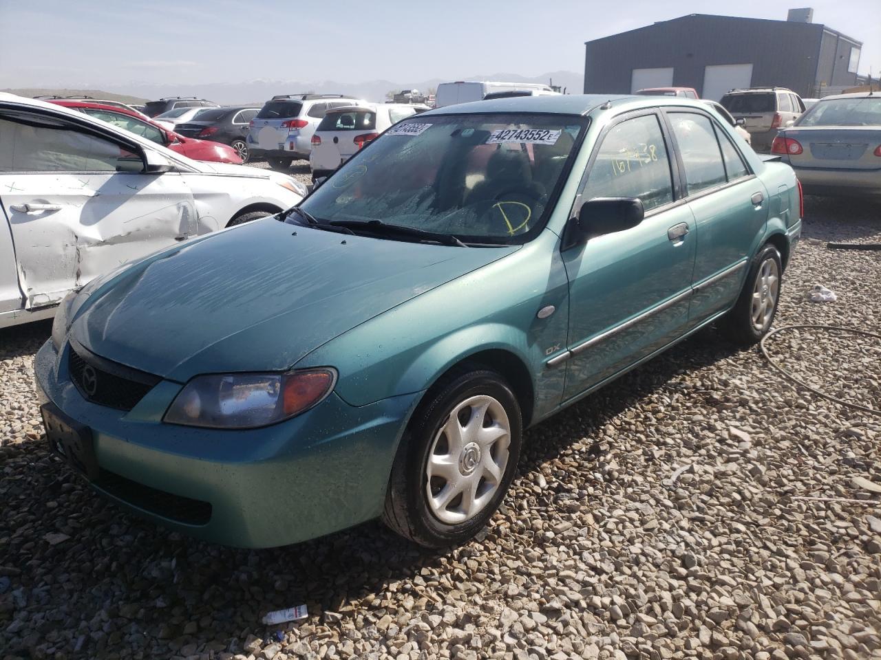 Photo 2 from auction – 2002 MAZDA PROTEGE DX with VIN JM1BJ225021606535