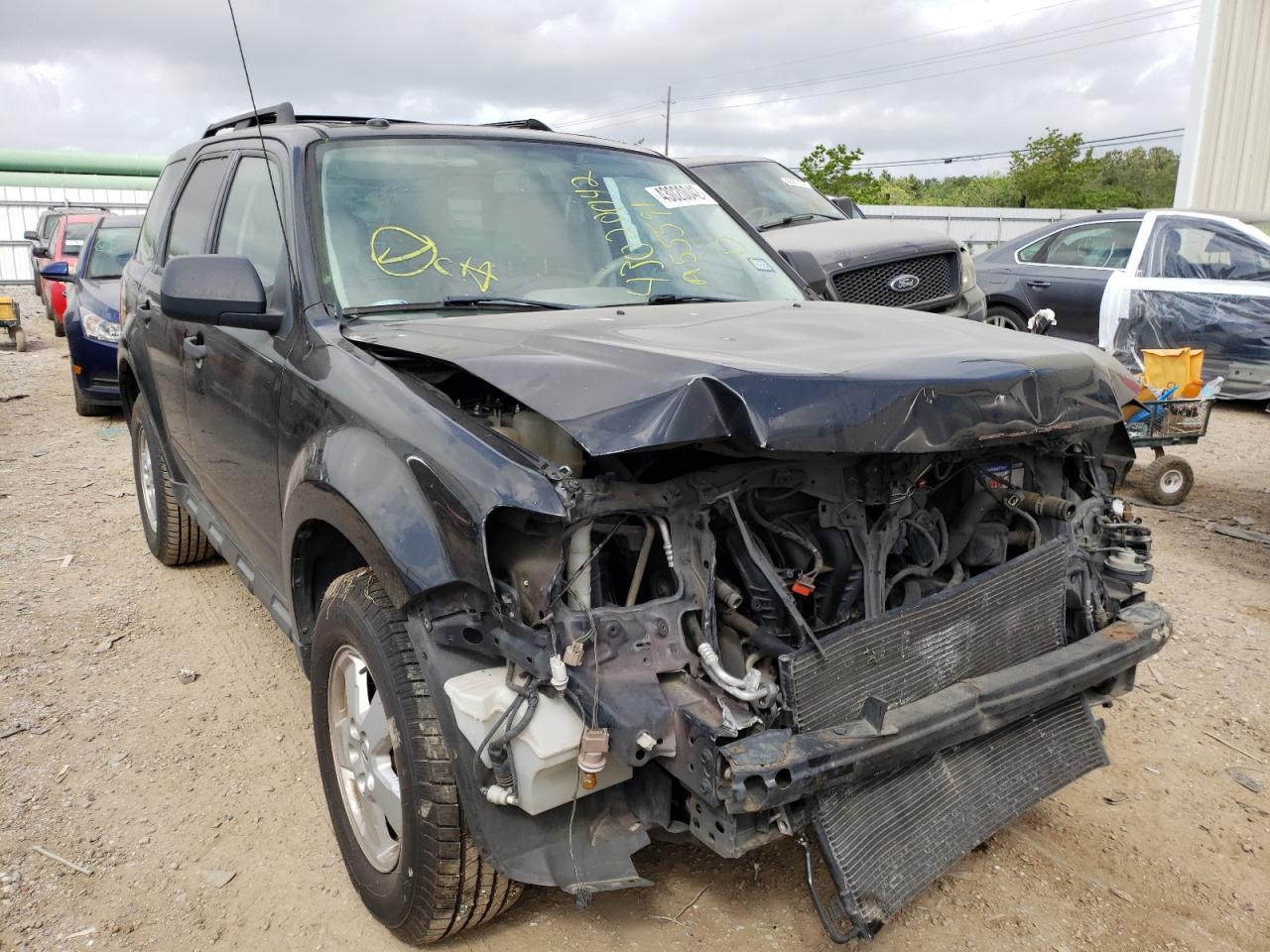 FORD ESCAPE XLT 2011 with VIN 1FMCU0D79BKA55591 - Photo from auction