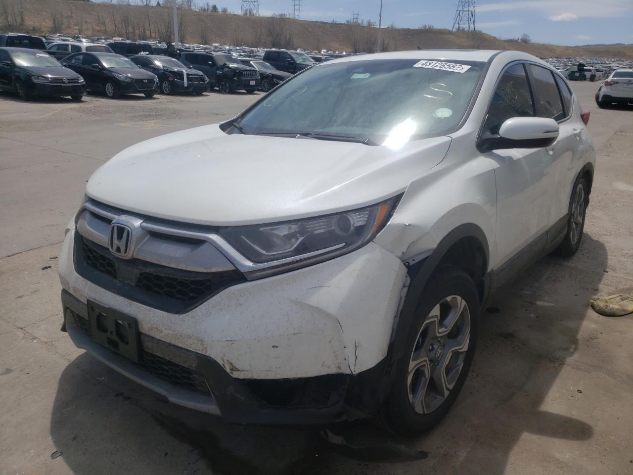 Photo 2 from auction – 2019 HONDA CR-V EX with VIN 7FARW2H55KE056915