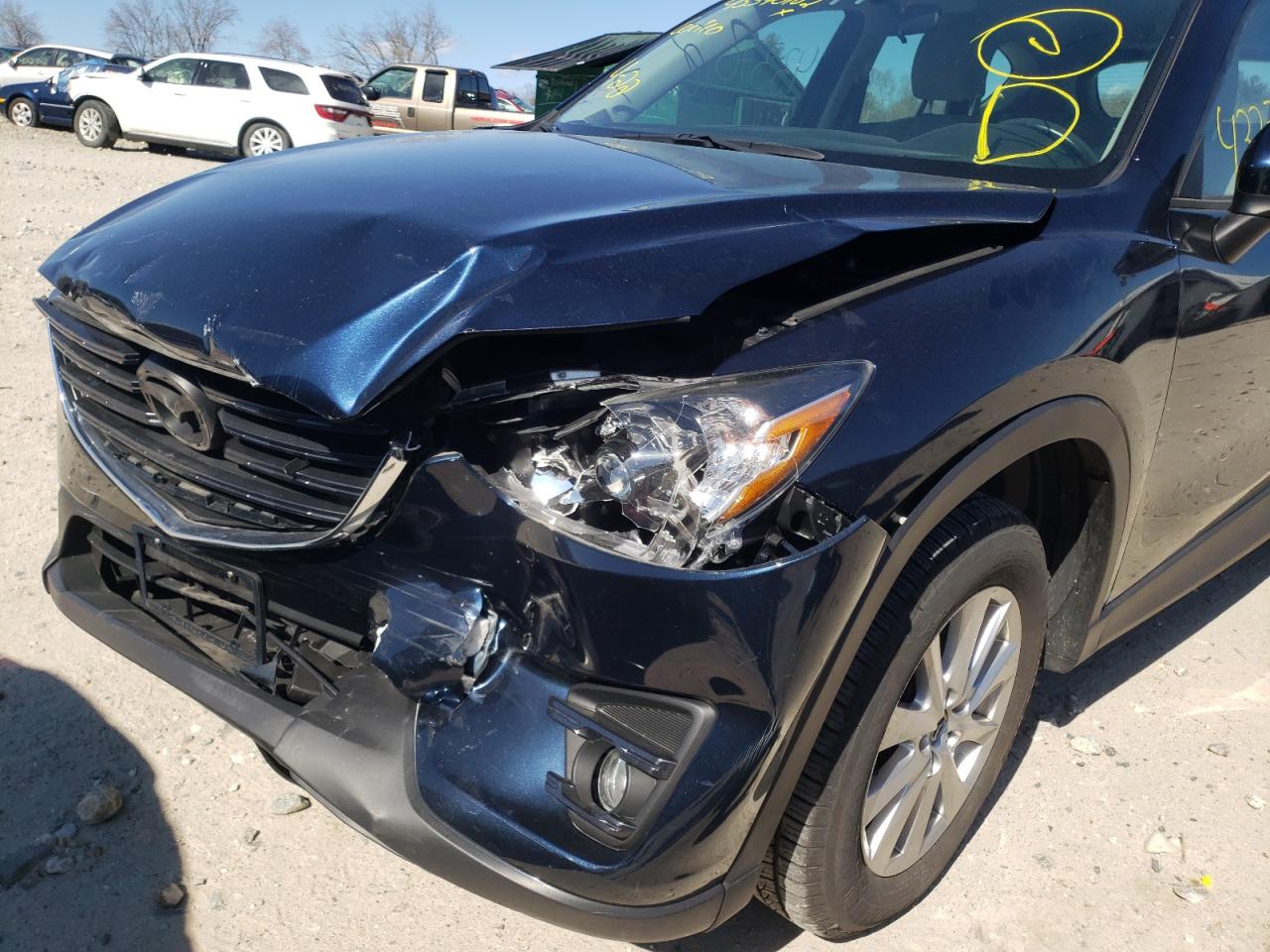 Photo 9 from auction – 2016 MAZDA CX-5 SPORT with VIN JM3KE4BY2G0885503