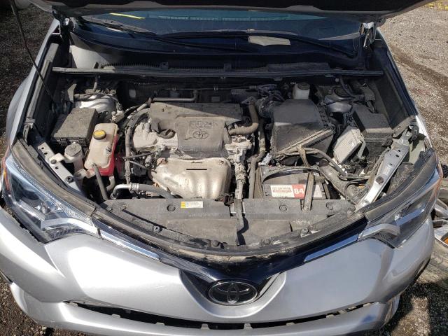 Photo 7 from auction – 2018 TOYOTA RAV4 LE with VIN 2T3BFREV6JW767834
