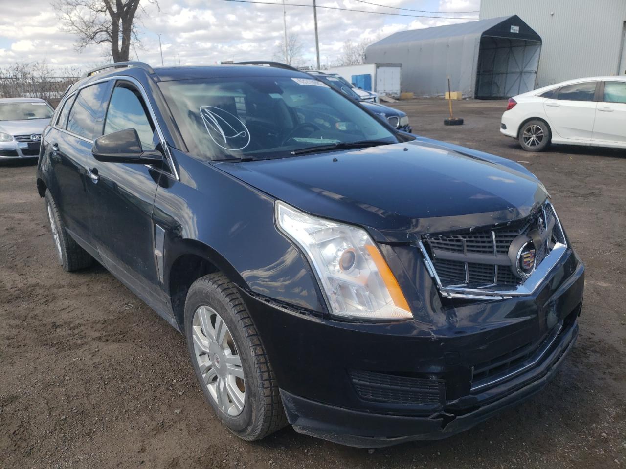 CADILLAC SRX 2012 with VIN 3GYFNGE36CS617725 - Photo from auction