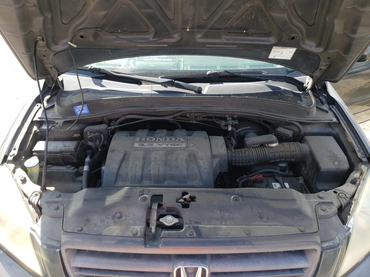 Photo 7 from auction – 2005 HONDA PILOT EX with VIN 2HKYF18415H506168