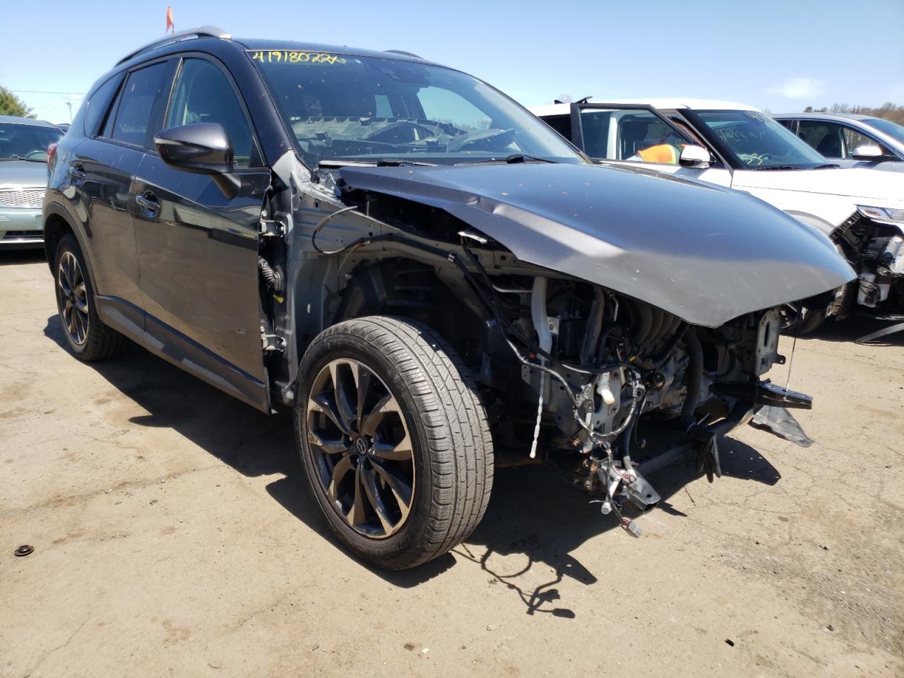MAZDA CX-5 GT 2016 with VIN JM3KE4DY5G0895598 - Photo from auction