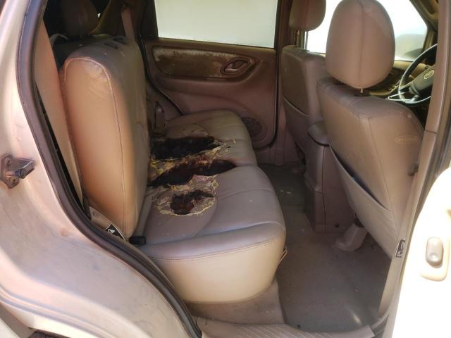 Photo 6 from auction – 2002 MAZDA TRIBUTE LX with VIN 4F2CU081X2KM54052