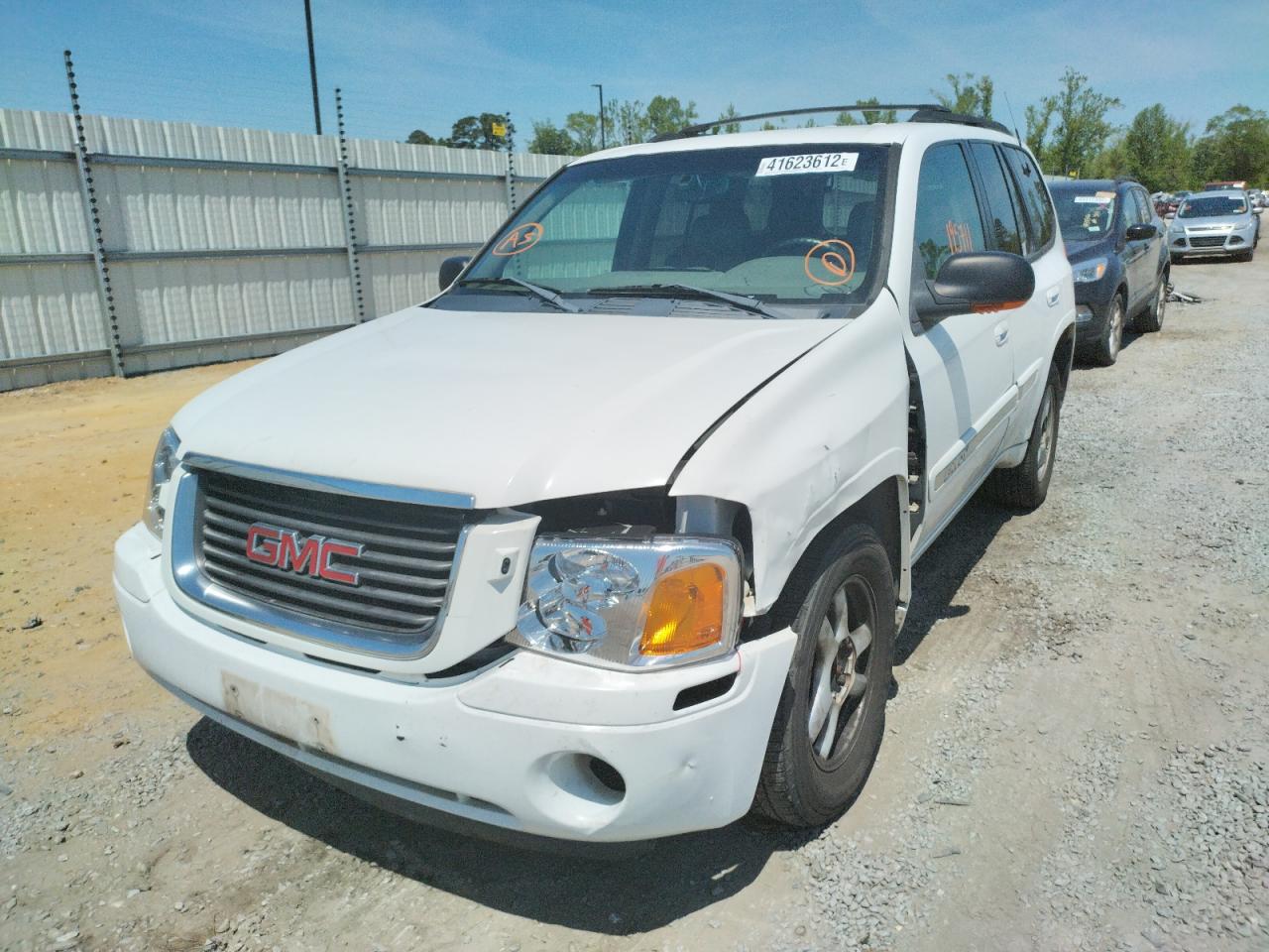 Photo 9 from auction – 2002 GMC ENVOY with VIN 1GKDT13S022131551