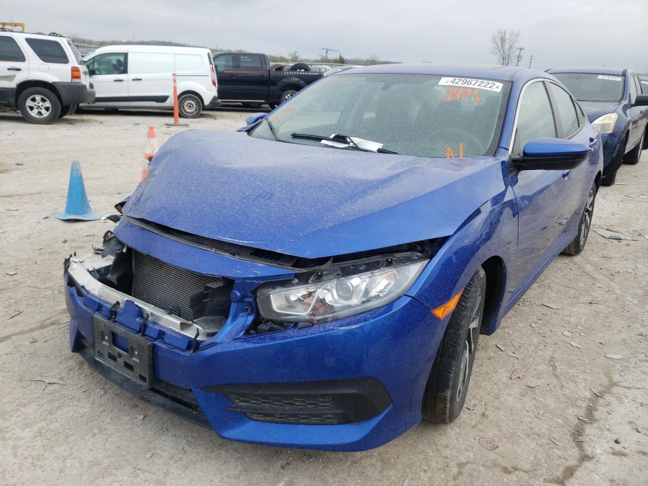 Photo 2 from auction – 2018 HONDA CIVIC EX with VIN 19XFC2F71JE035107