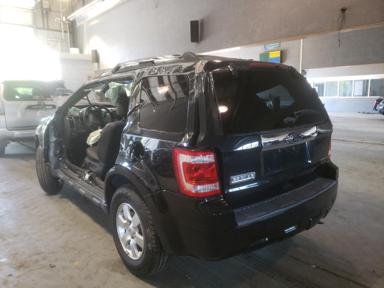 Photo 3 from auction – 2011 FORD ESCAPE LIM with VIN 1FMCU0E71BKC01268