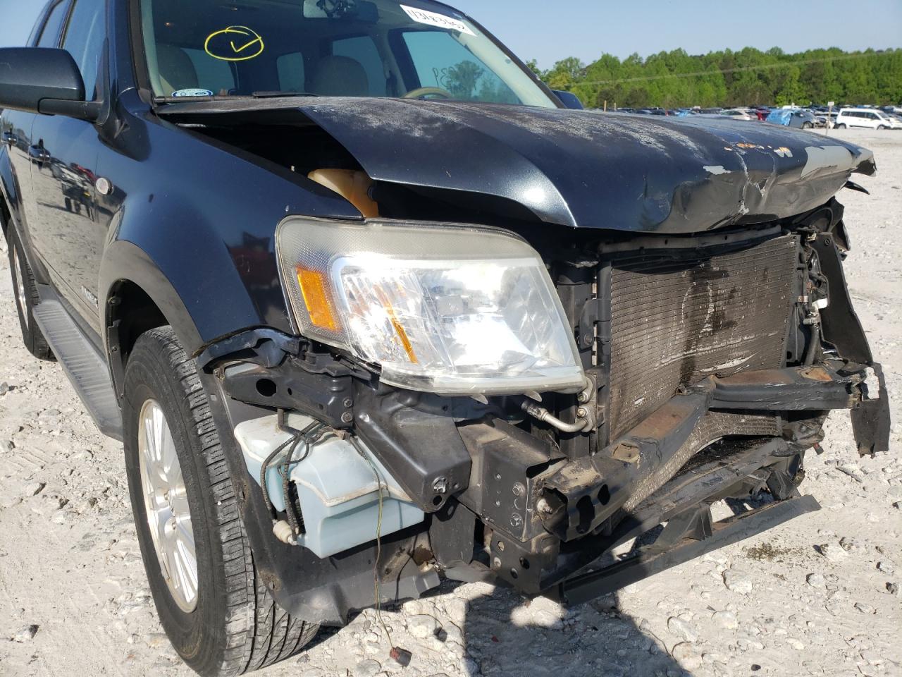 Photo 9 from auction – 2008 MERCURY MARINER PR with VIN 4M2CU87148KJ23017