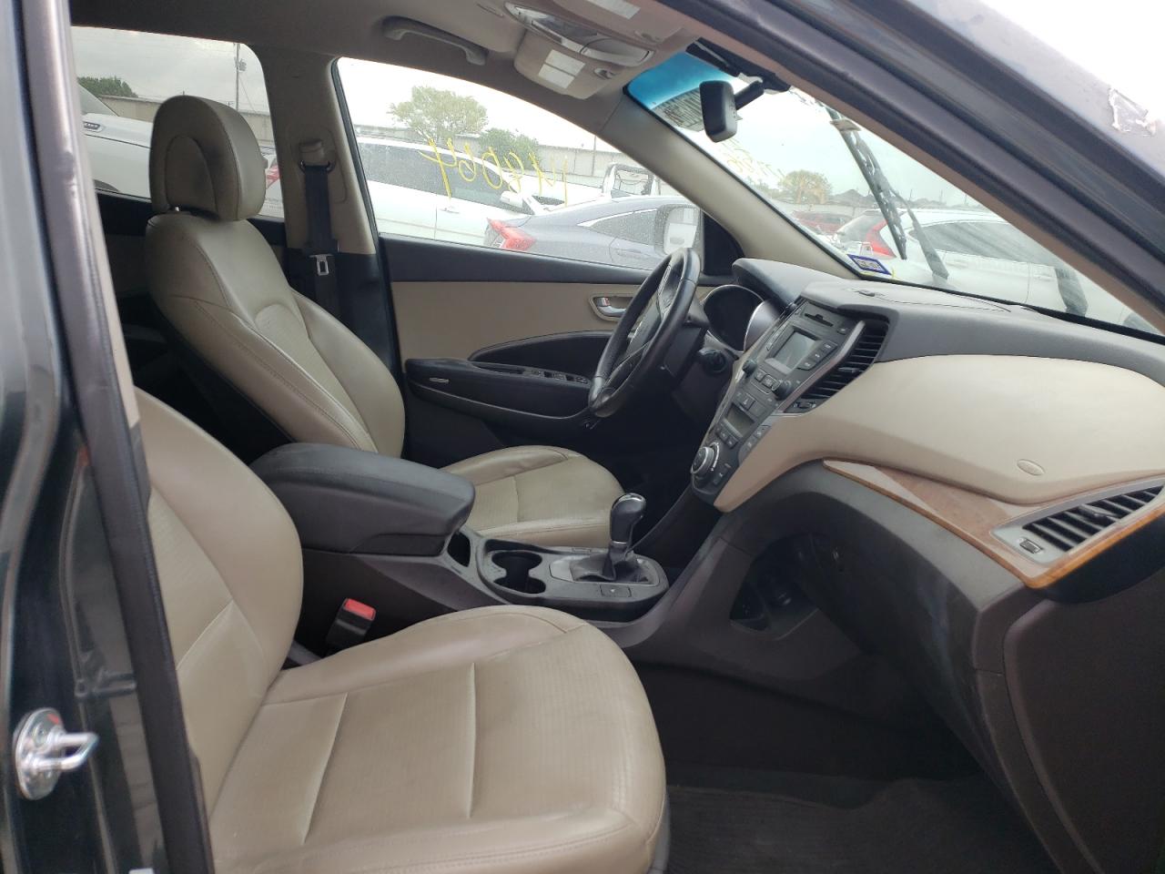 Photo 5 from auction – 2013 HYUNDAI SANTA FE S with VIN 5XYZU3LA3DG123728