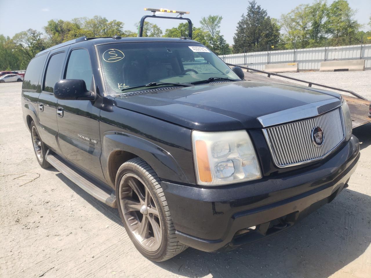 CADILLAC ESCALADE E 2003 with VIN 3GYFK66N23G293677 - Photo from auction