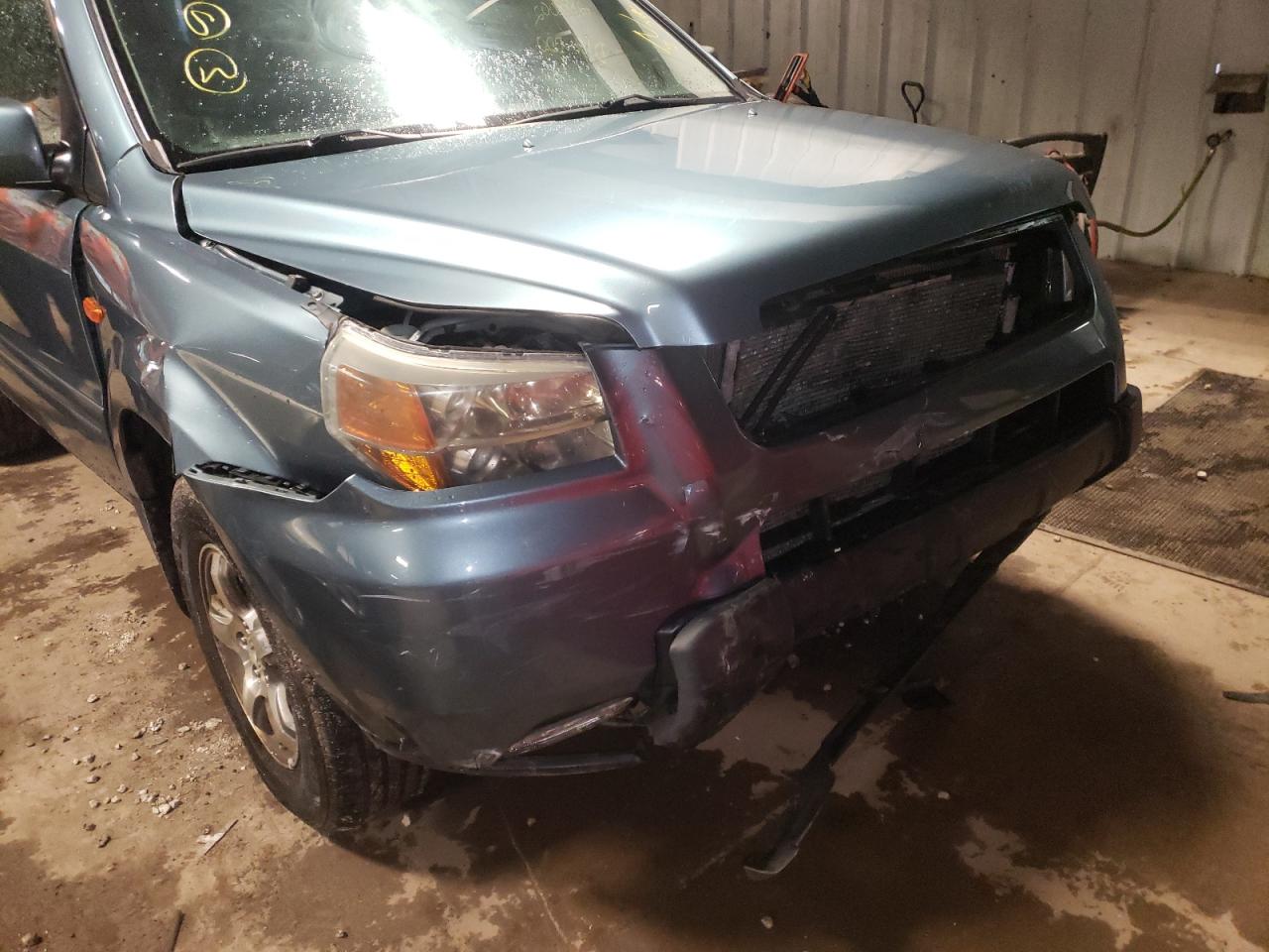 Photo 9 from auction – 2006 HONDA PILOT EX with VIN 2HKYF18616H500180