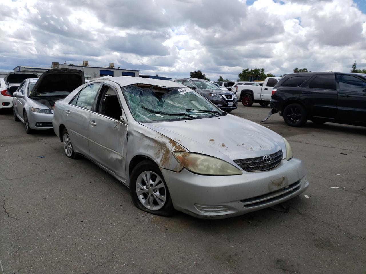 TOYOTA CAMRY LE 2004 with VIN 4T1BF32K64U076162 - Photo from auction