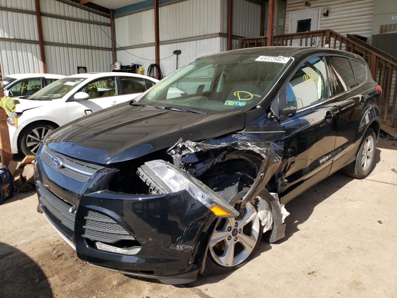 Photo 2 from auction – 2016 FORD ESCAPE SE with VIN 1FMCU0G70GUA02463