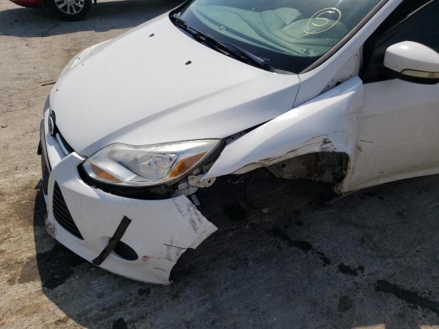 Photo 9 from auction – 2013 FORD FOCUS SE with VIN 1FADP3F26DL136232