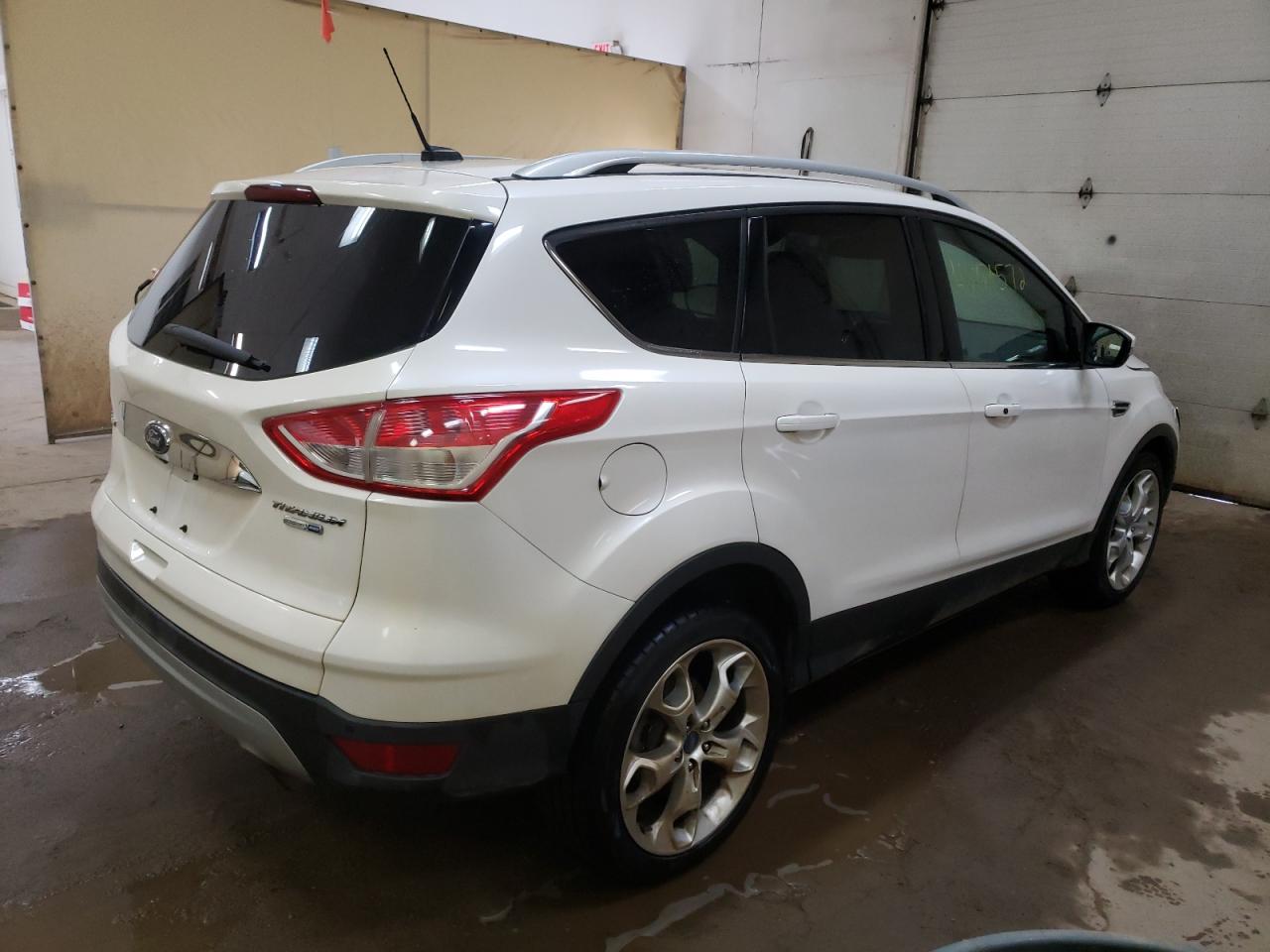Photo 4 from auction – 2014 FORD ESCAPE TIT with VIN 1FMCU9J98EUB13080