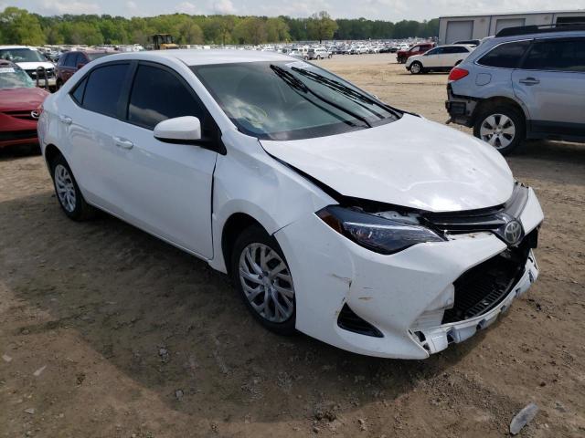 TOYOTA COROLLA L 2017 with VIN 5YFBURHE9HP679477 - Photo from auction