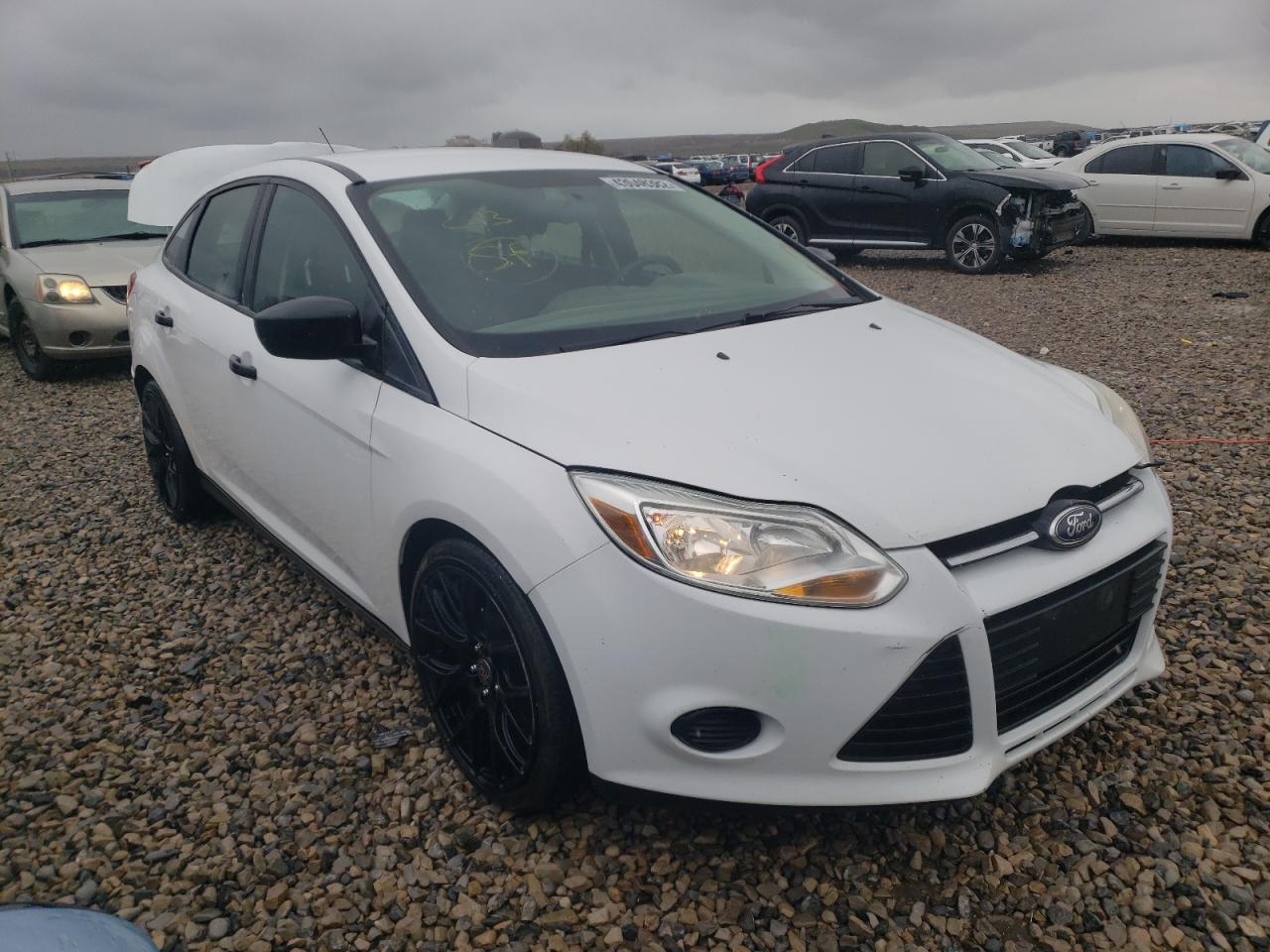 FORD FOCUS S 2013 with VIN 1FADP3E20DL210245 - Photo from auction