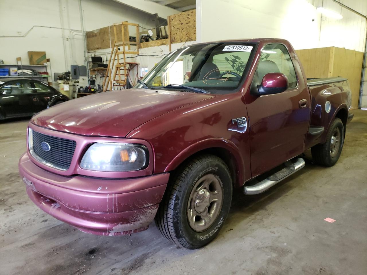 Photo 2 from auction – 2003 FORD F150 with VIN 2FTRF07L33CB11466